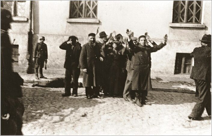 German soldiers round-up a group of Jewish men on Strazacka Street in Czestochowa